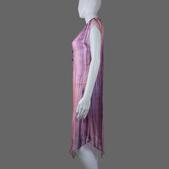 Mannequin wearing a sheer pink fabric over a plain background