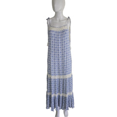 Blue and white patterned dress on a light background