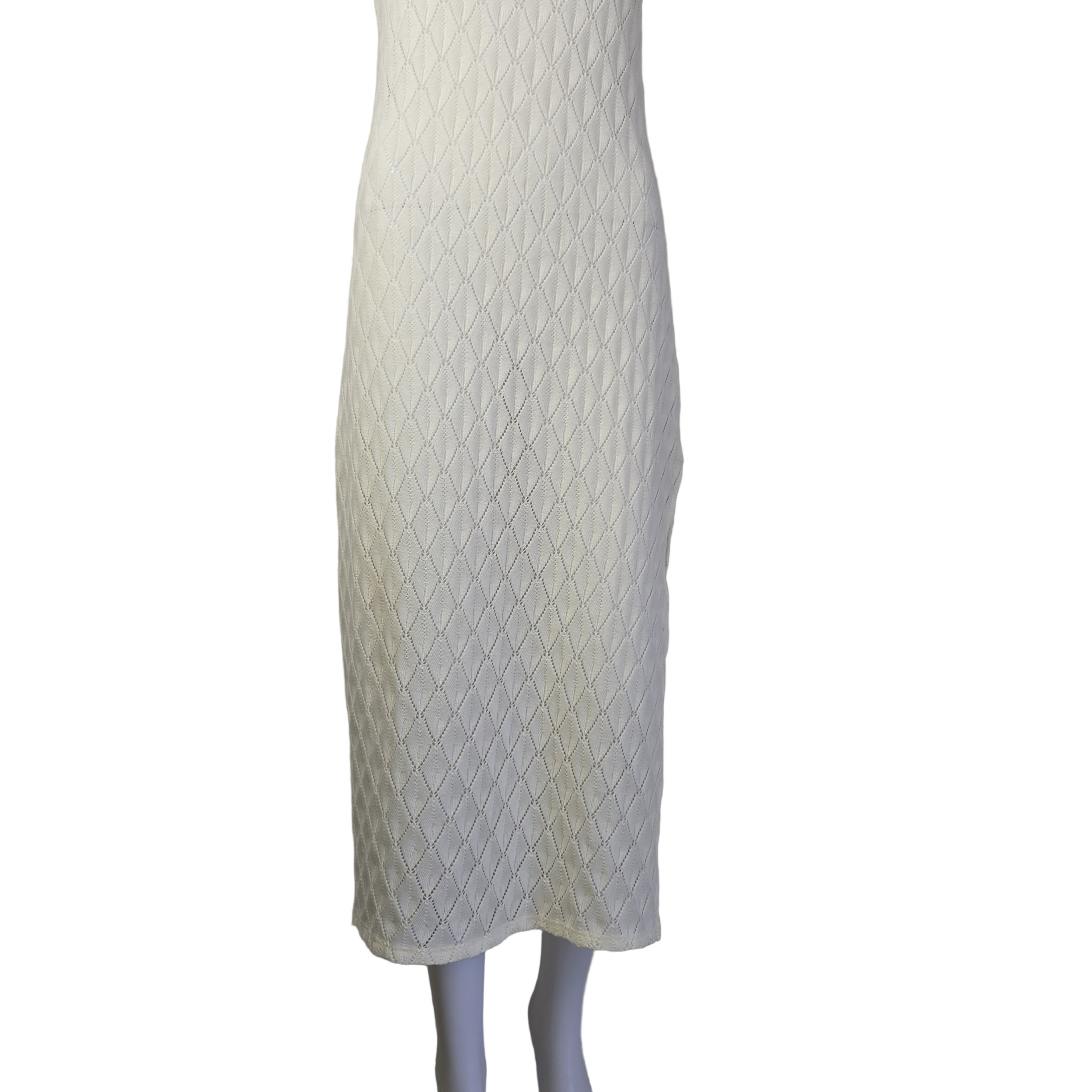 White textured dress on a light background.