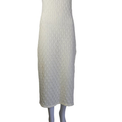 White textured dress on a light background.