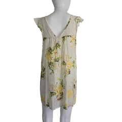 Floral dress on a mannequin against a plain background