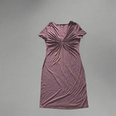 Purple dress on a tiled floor