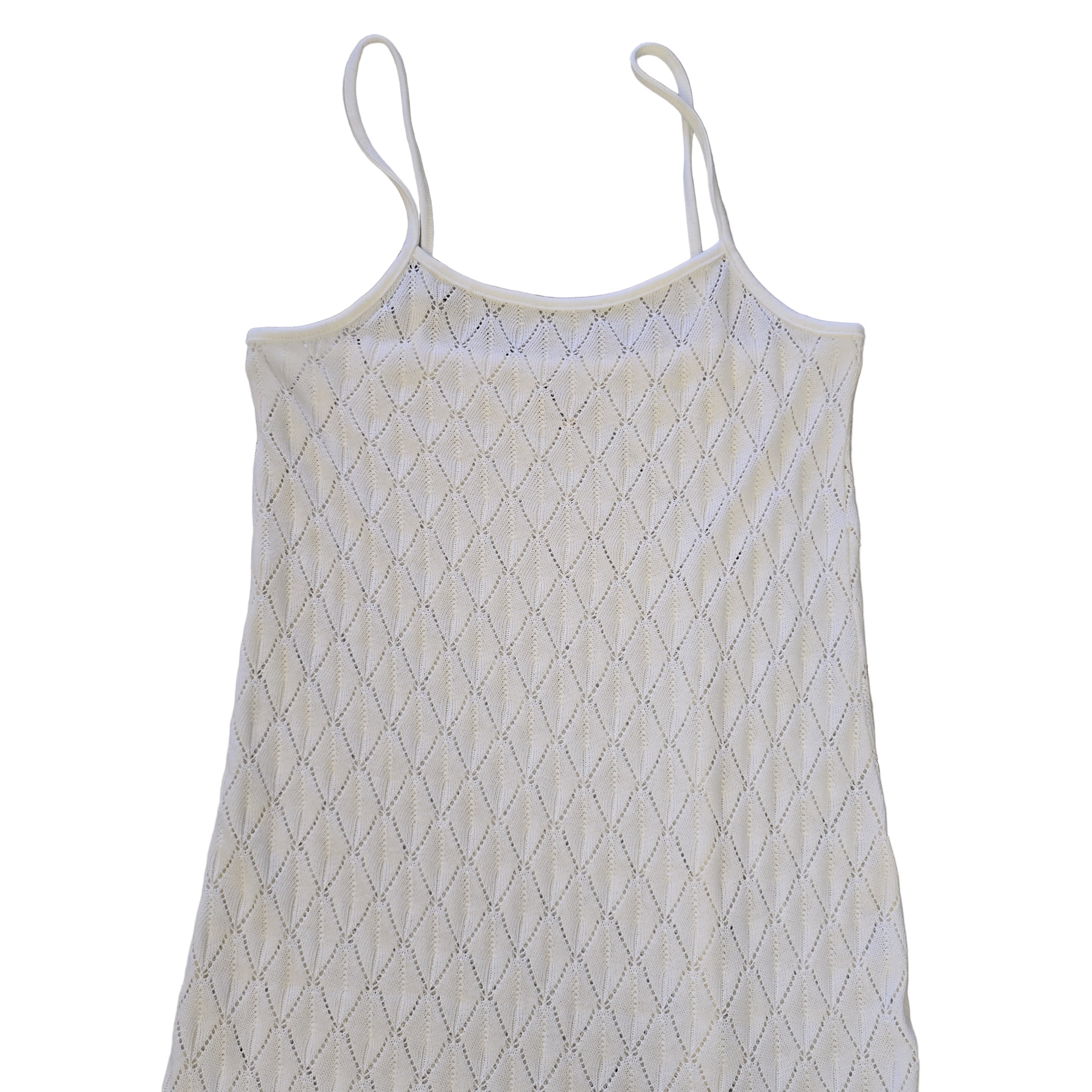 White textured dress on a light background.