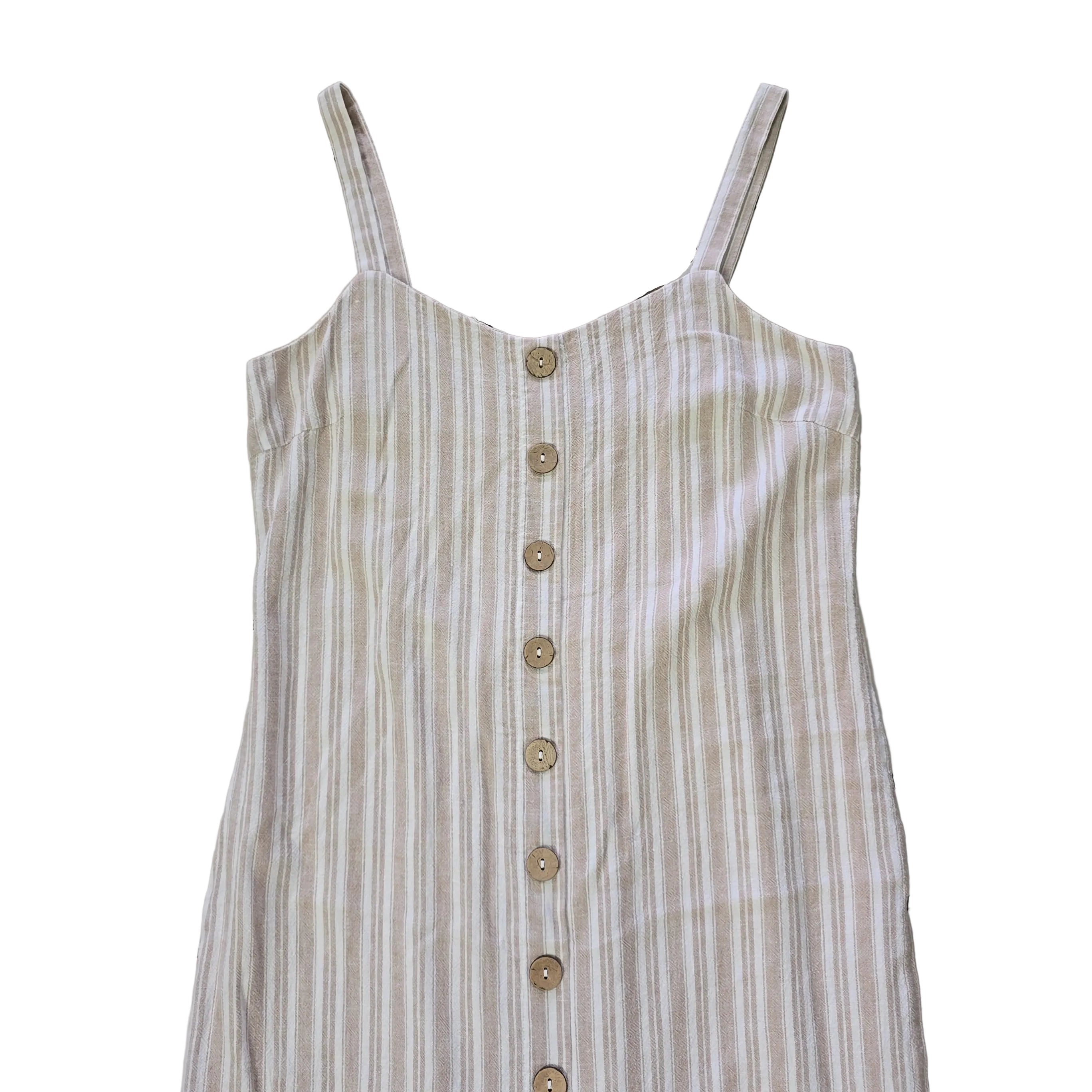 Striped dress with button details on a light background