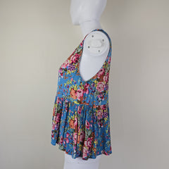 Blue floral top with on a light background