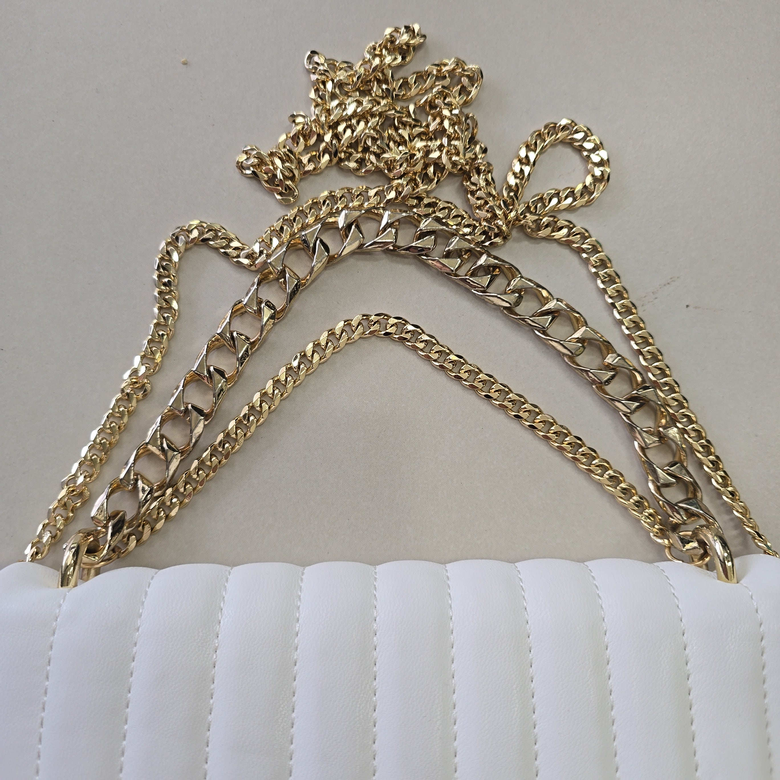 Gold chain on a white background