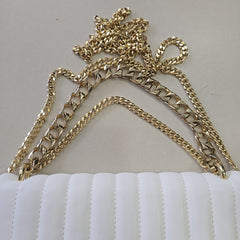 Gold chain on a white background