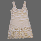 Beige dress on a light background