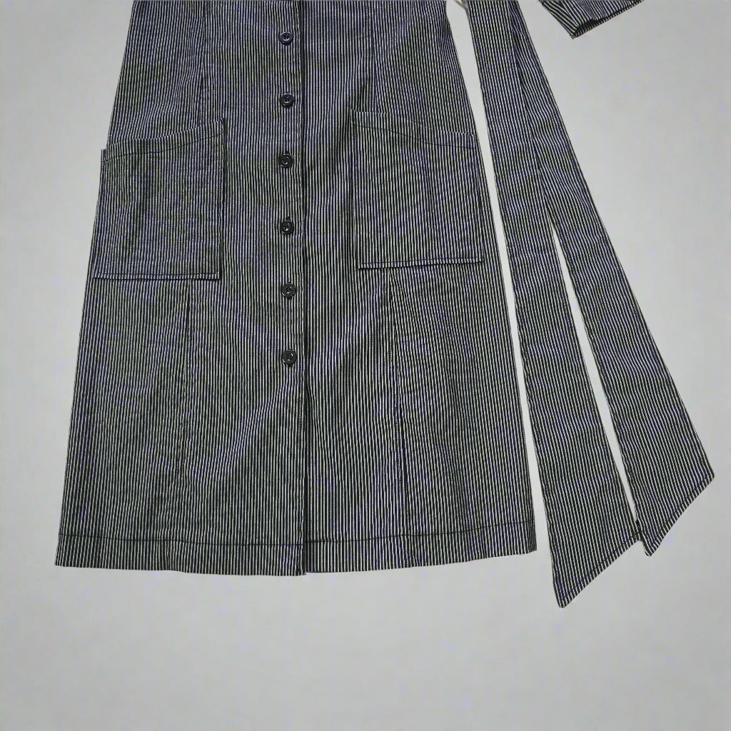 Gray striped suit jacket on a tiled floor