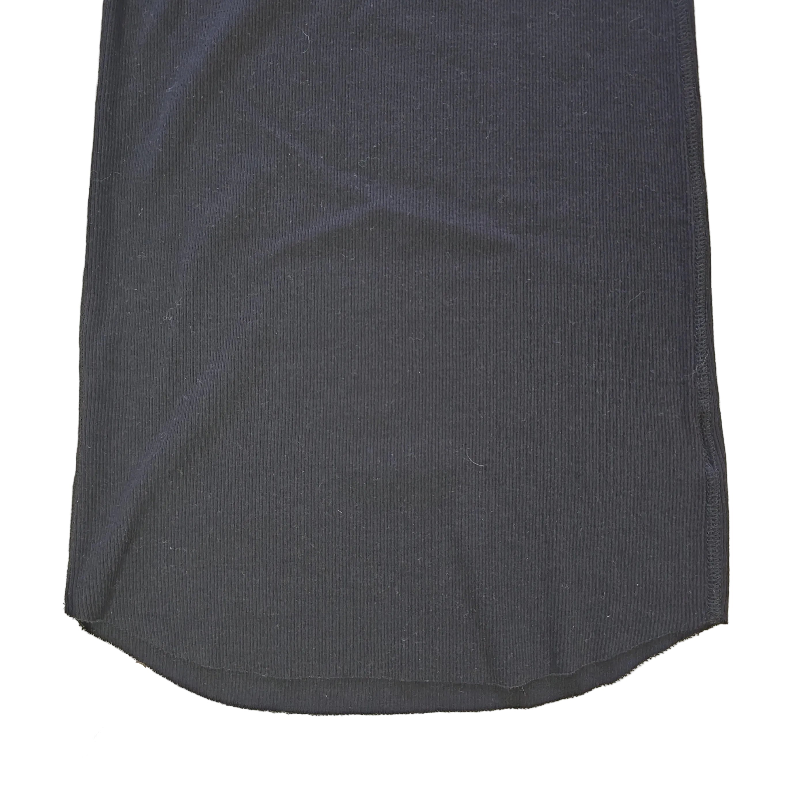 Black sleeveless top on a light background