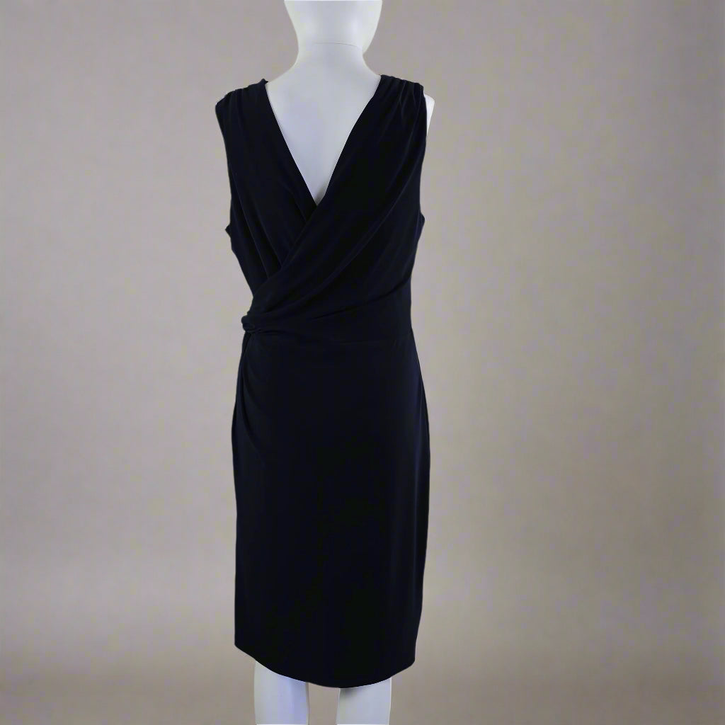 Navy dress on a mannequin against a white background