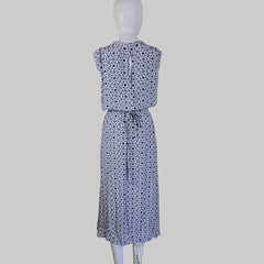 Blue floral-patterned strapless dress on a mannequin against a neutral background