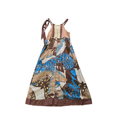 Dress with butterfly pattern on a tiled floor