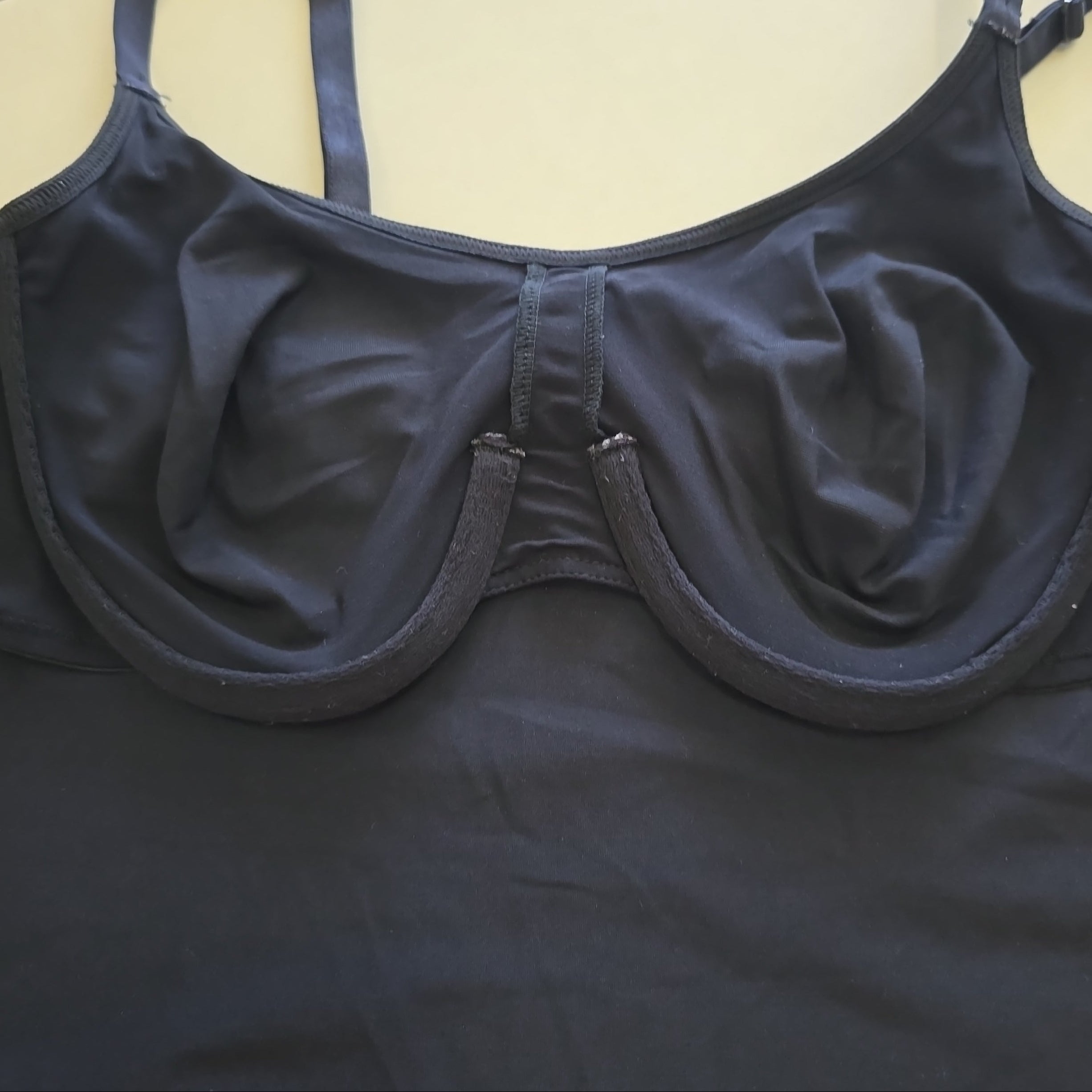 Black bra on a light surface