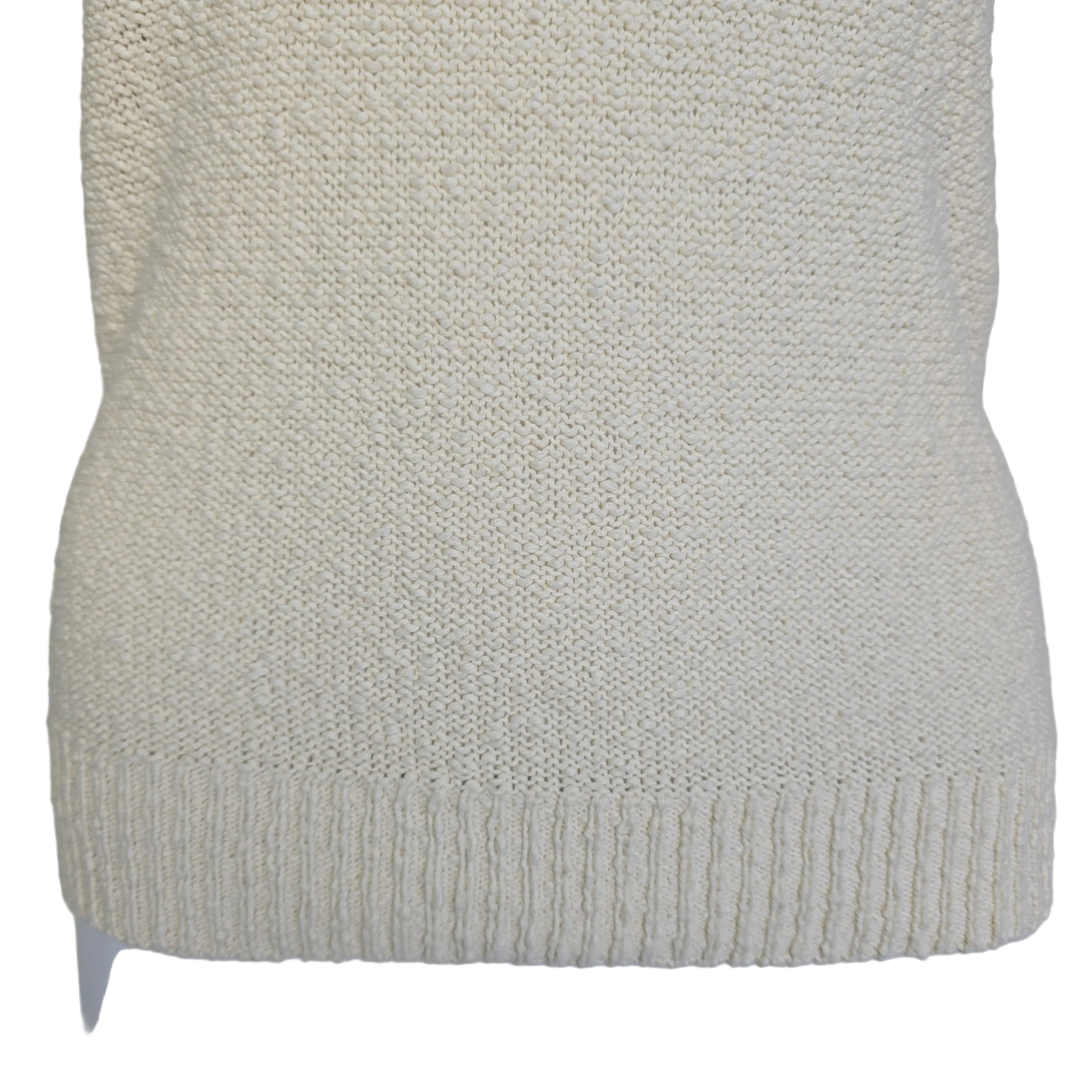 White knitted tank top on a light background