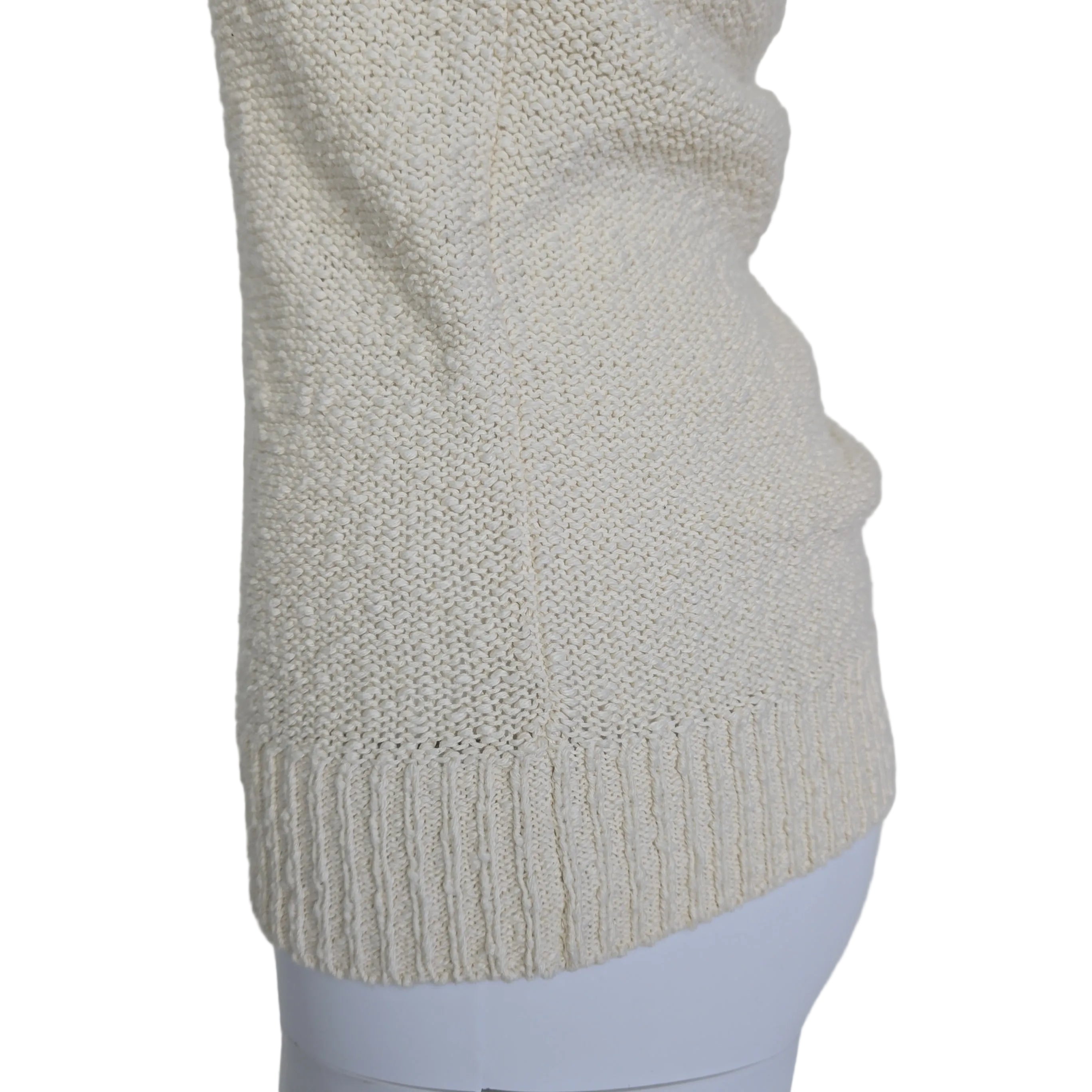 White knitted tank top on a light background