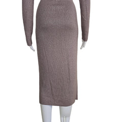 Mannequin wearing a plum textured dress on a plain background