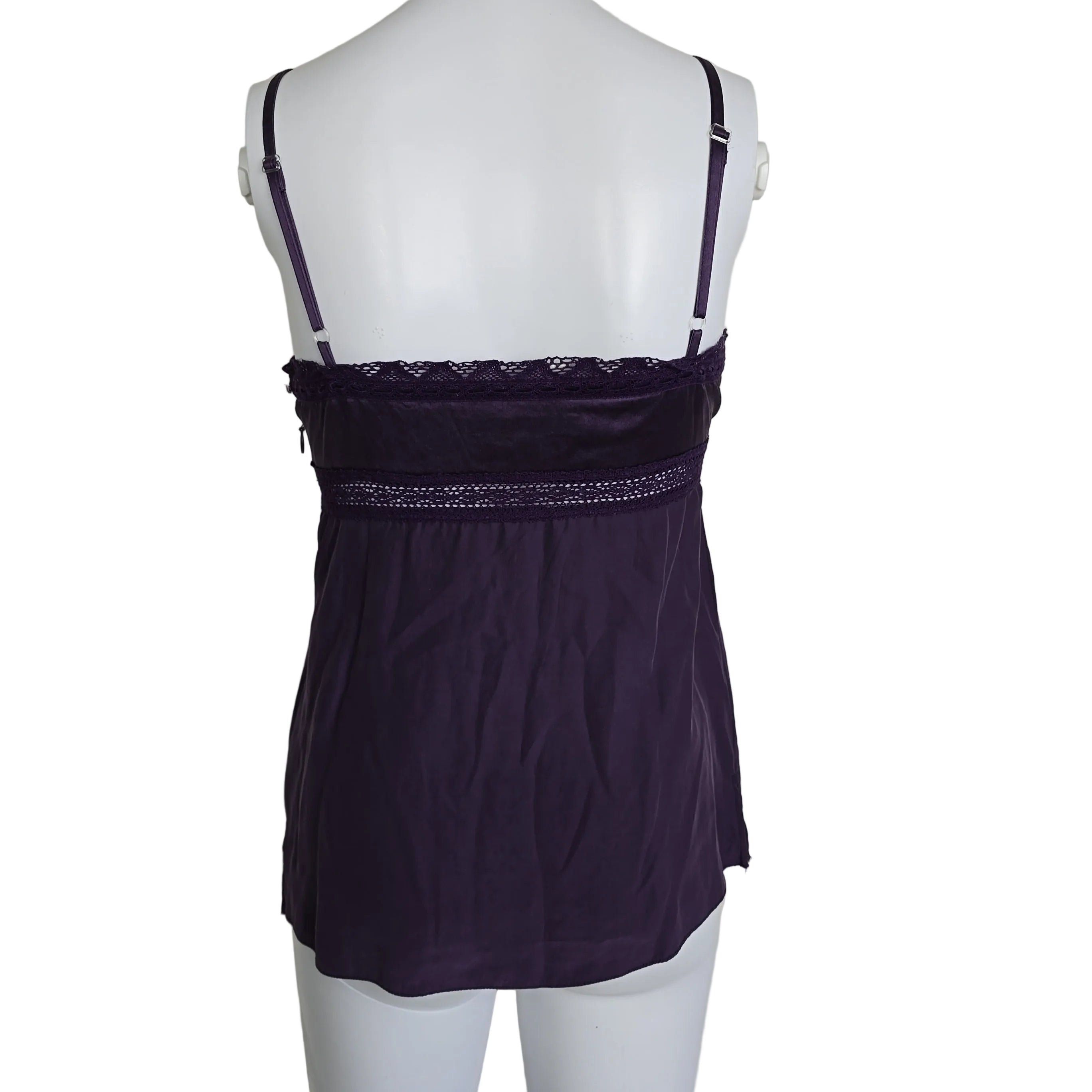 Purple lace-trimmed top on a light background