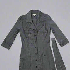 Gray striped coat on a tiled floor