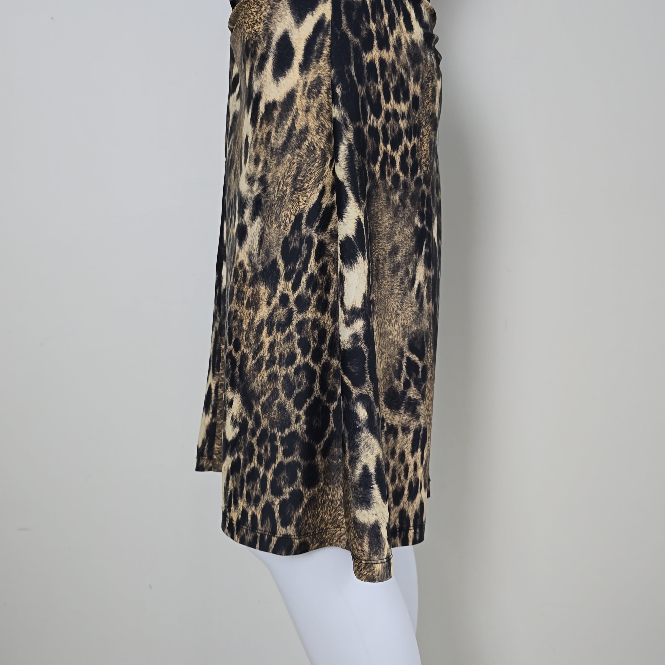 Leopard print dress on a light background