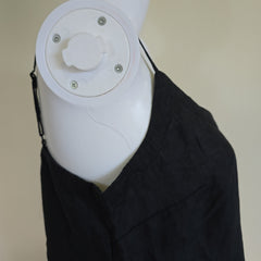 Black tank top on a light background