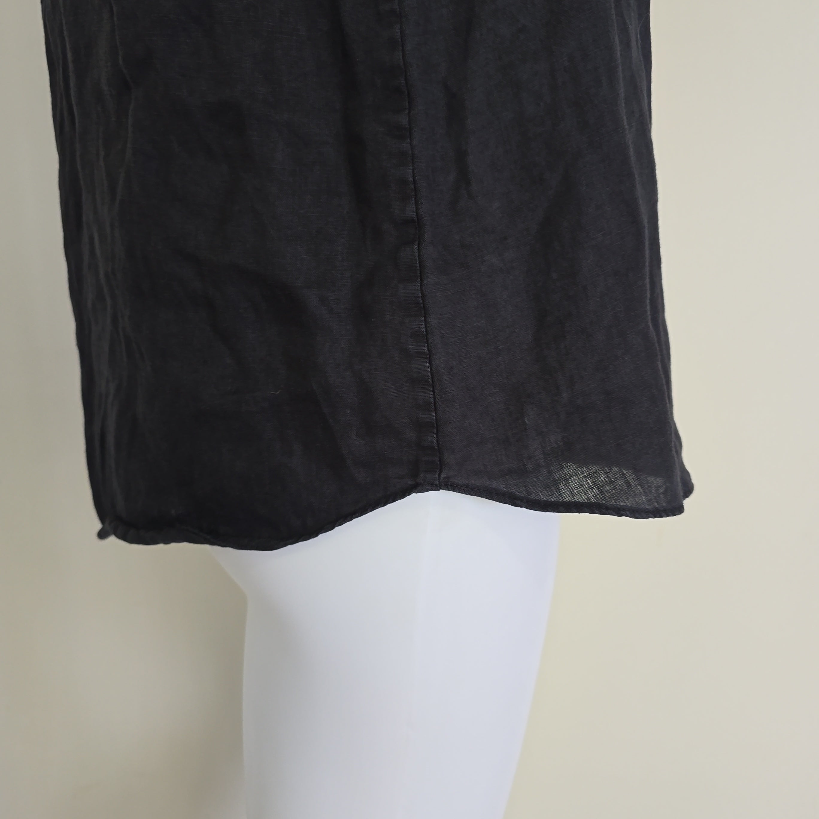 Black top on a light background