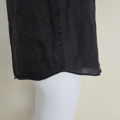 Black top on a light background