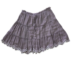 Grey ruffled skirt on a light background