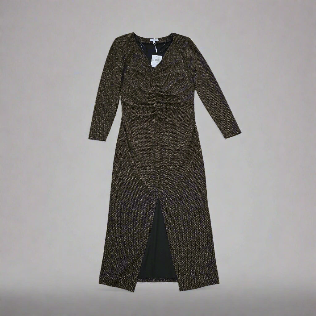 Black and gold textured dress against a light gray background