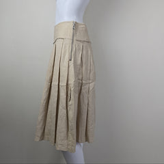 Beige skirt on a mannequin against a plain background
