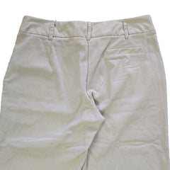 Light-colored pants on a tiled floor