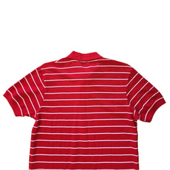 Red and white striped polo shirt on a light background