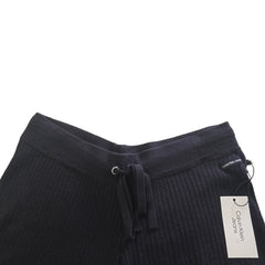 Black cotton shorts with a Calvin Klein label on a light background.