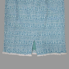 Blue textured fabric on a tiled floor