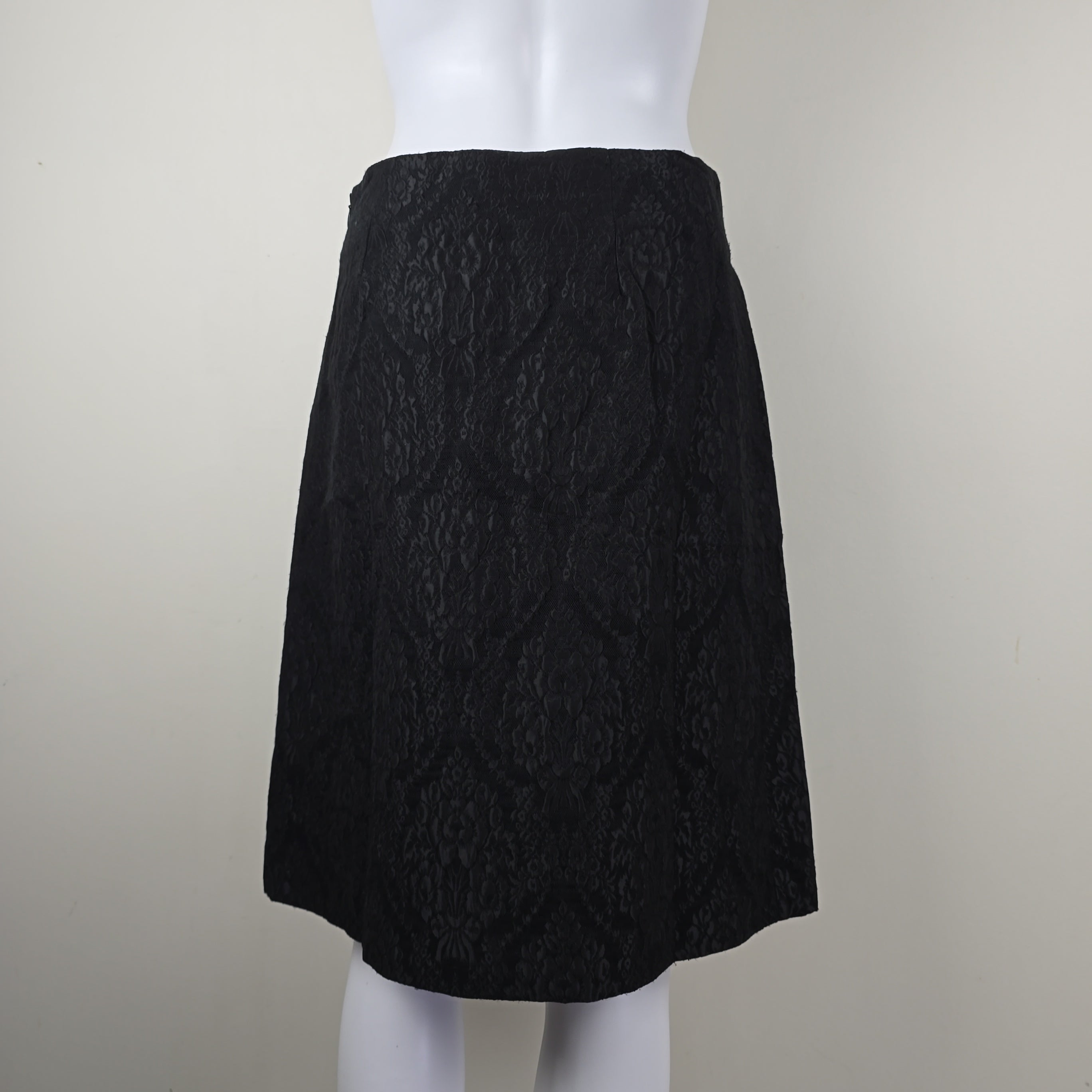 Black textured skirt on a white background