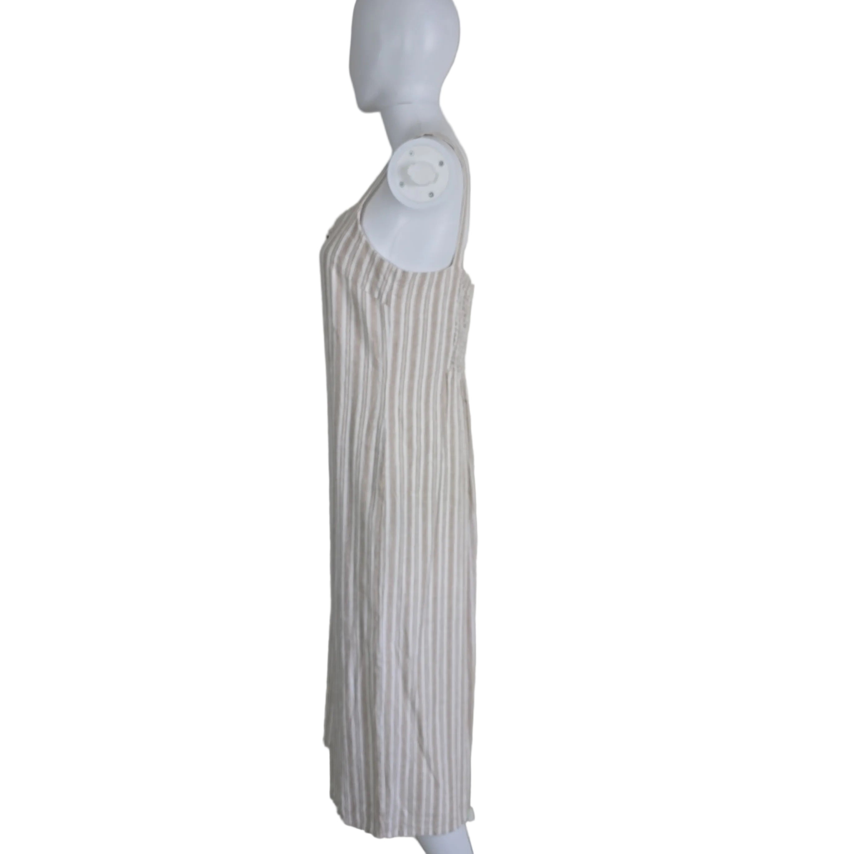 Striped dress with button details on a light background