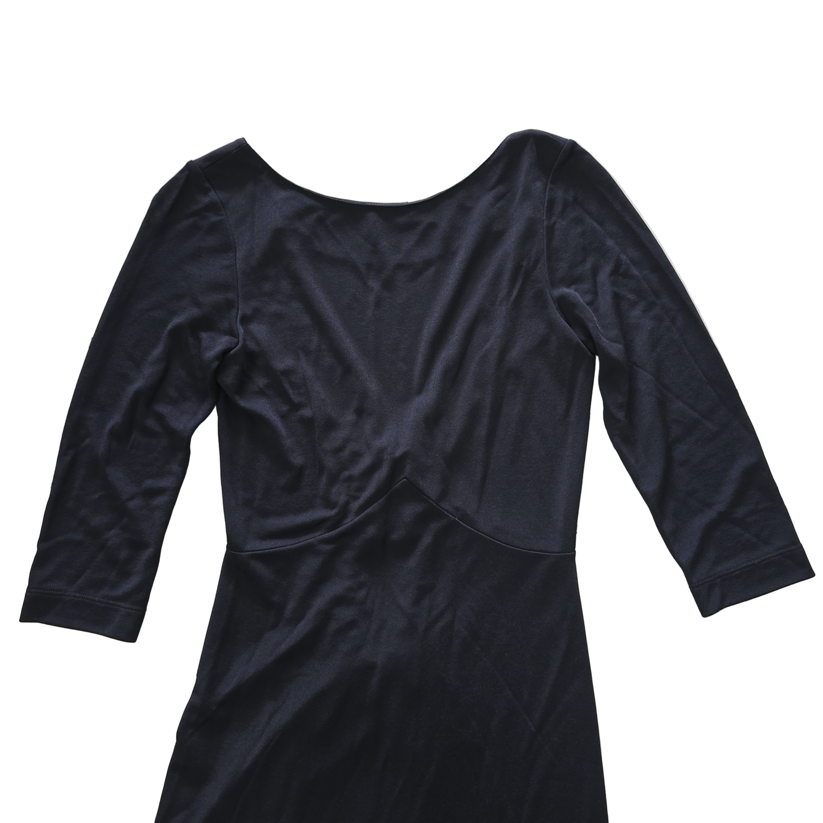 Black dress on a light background