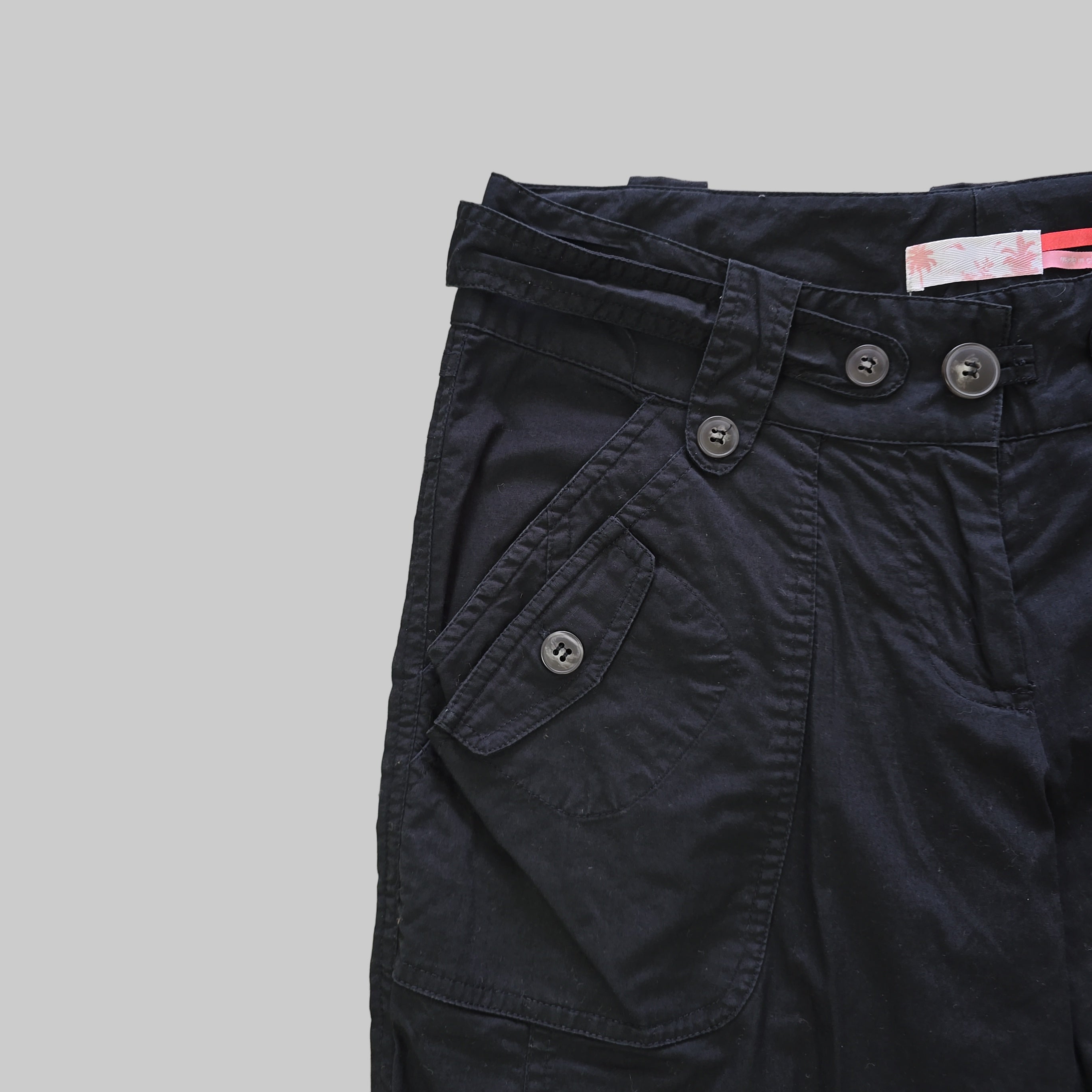 Pair of black pants on a light background