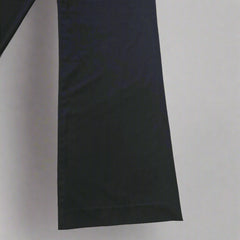 Black Pants on a tiled floor