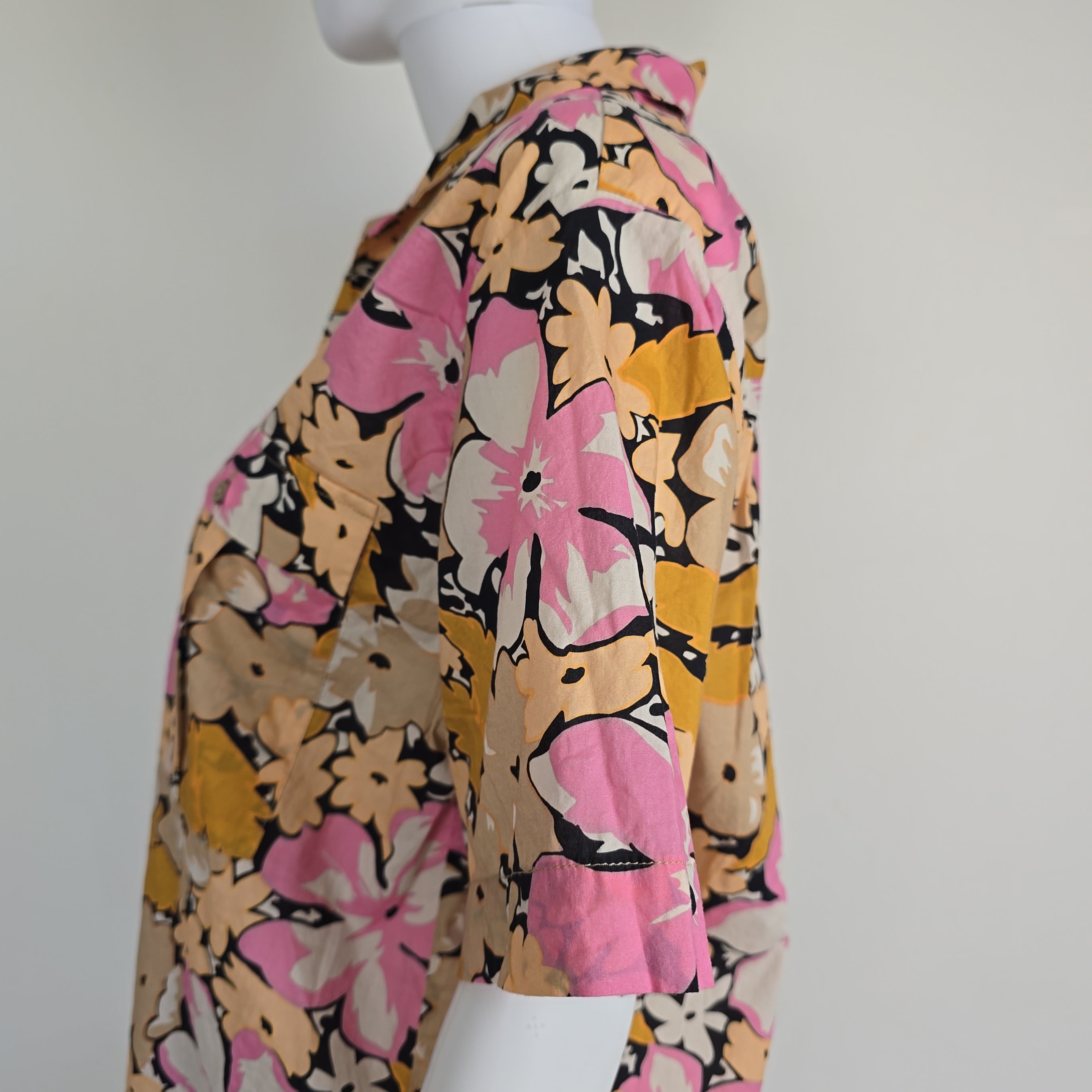 Floral-patterned shirt on a light background