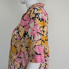 Floral-patterned shirt on a light background