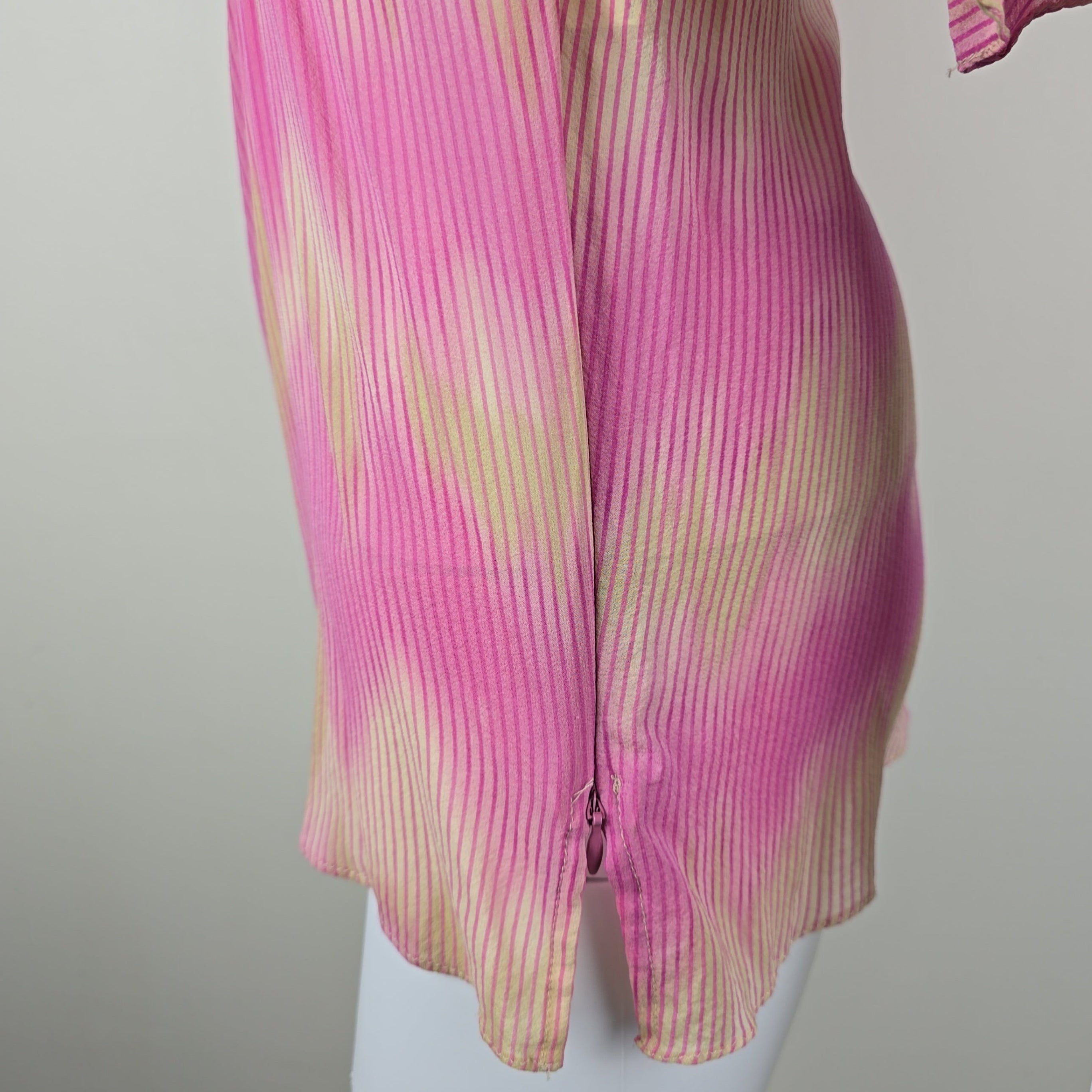 Pink and yellow striped fabric on a white background
