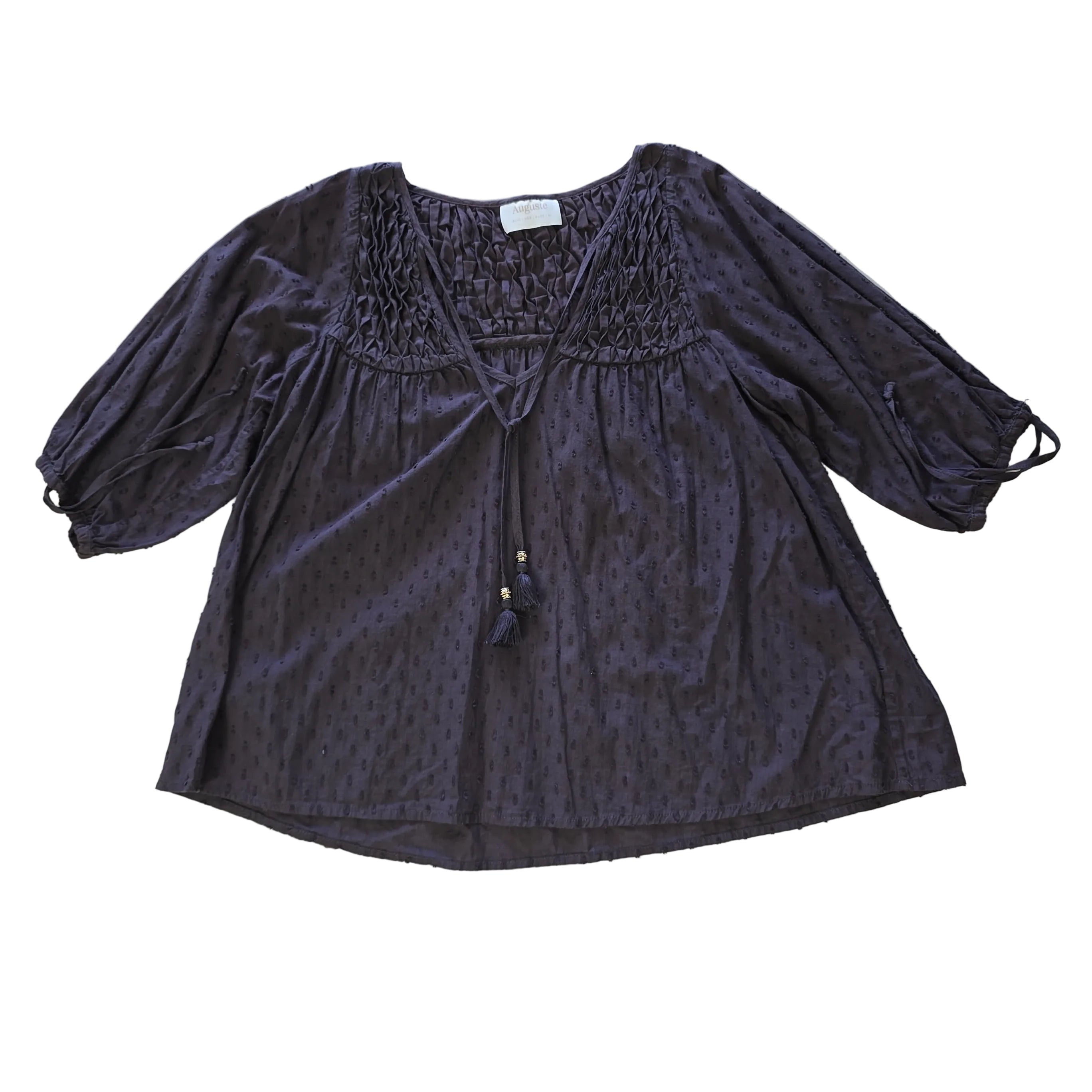 Brown long-sleeve top on a light background