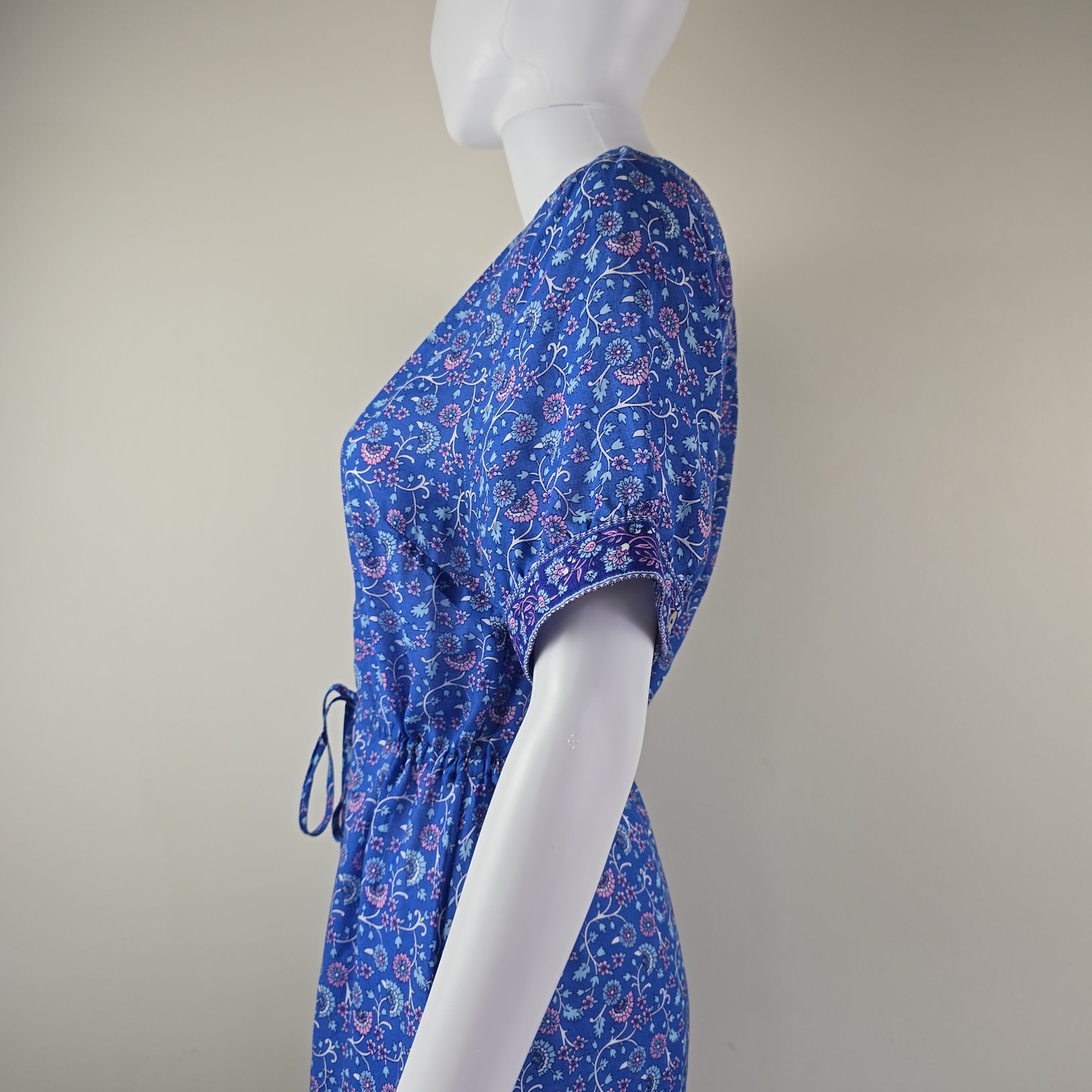 Blue floral dress on a light background