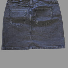 Grey denim skirt on a tiled floor