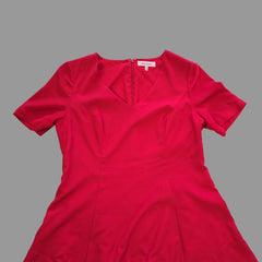 Red dress on a tiled floor