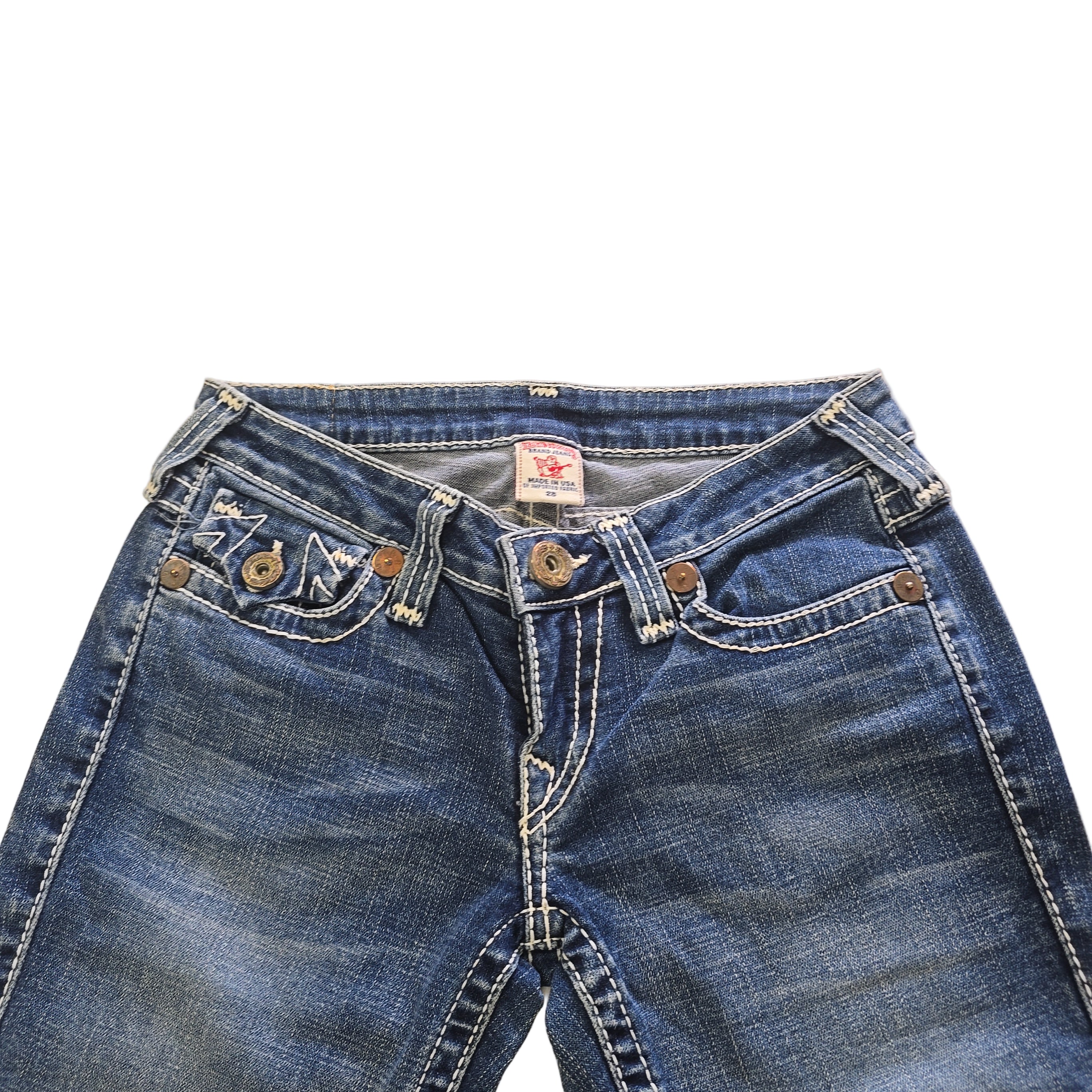 Pair of blue jean shorts on a light background