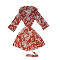 Orange and white palm patterned robe on a light background