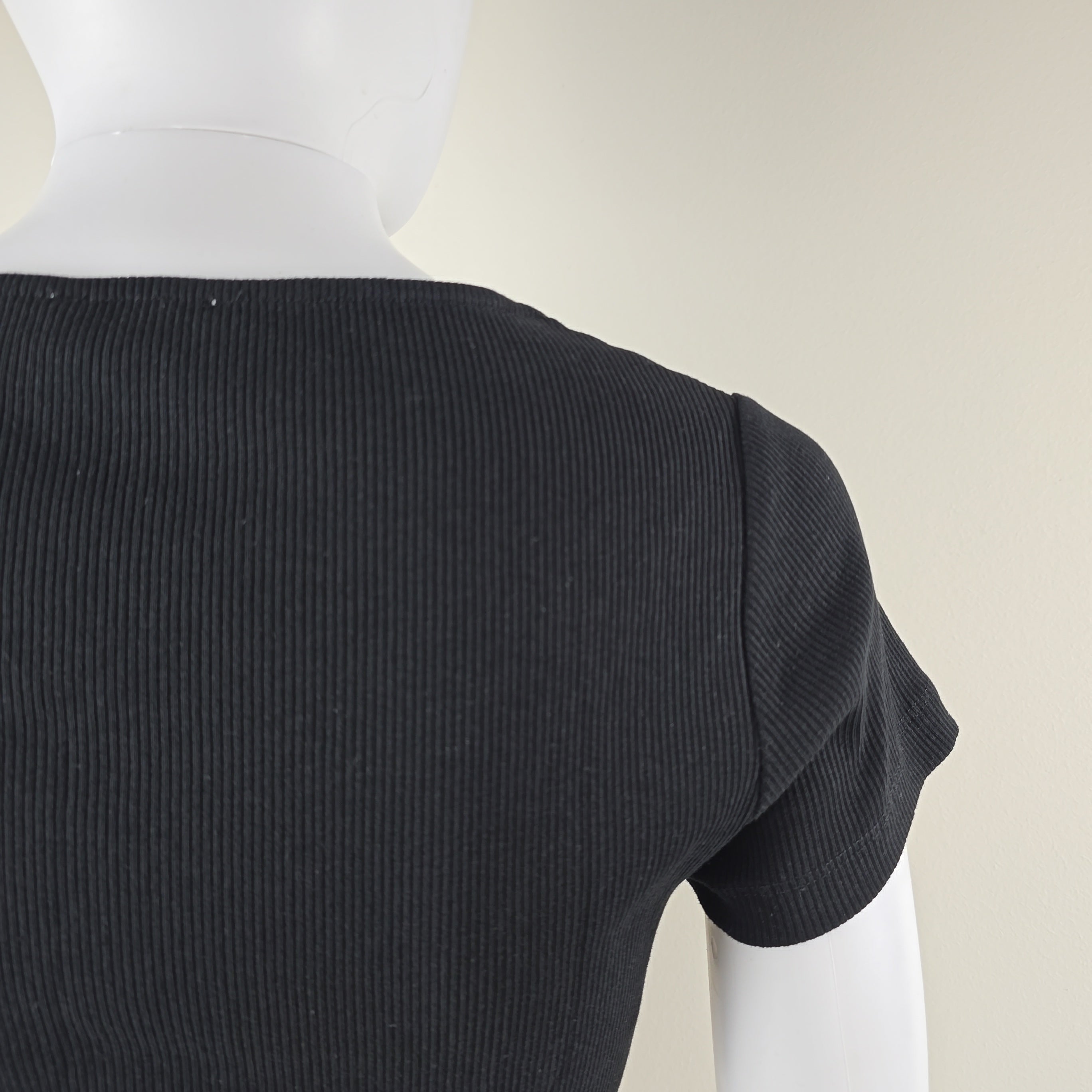 Close-up of a black textured fabric on a white background