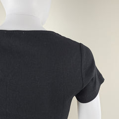 Close-up of a black textured fabric on a white background